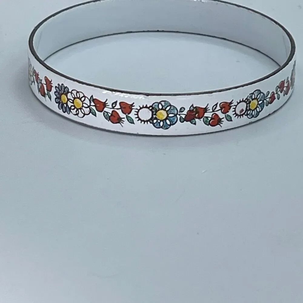 Vintage enamel floral  hearts on vine bangle bracelet.